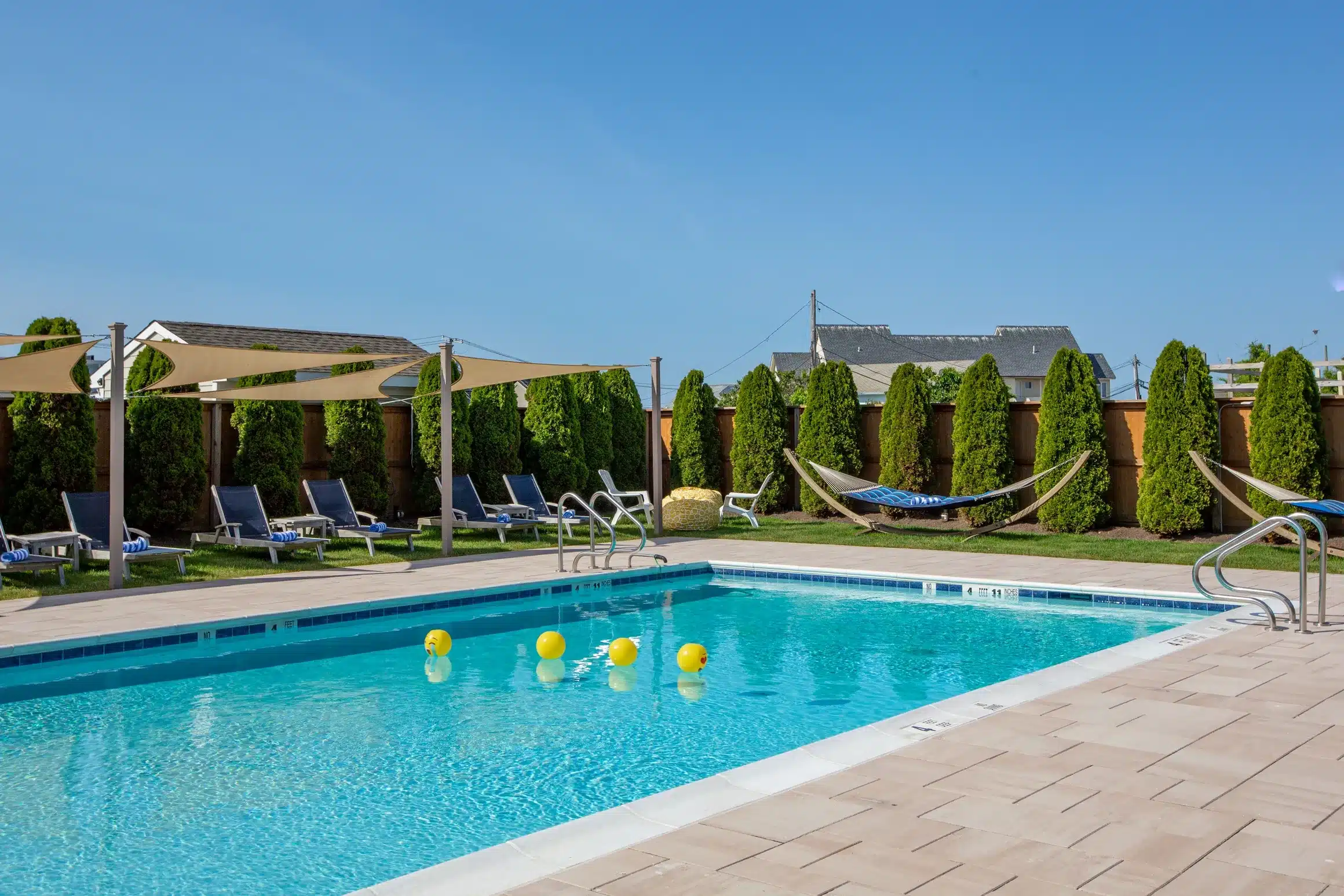 Outdoor saltwater heated pool at Aqualina Inn, Montauk, NY USA